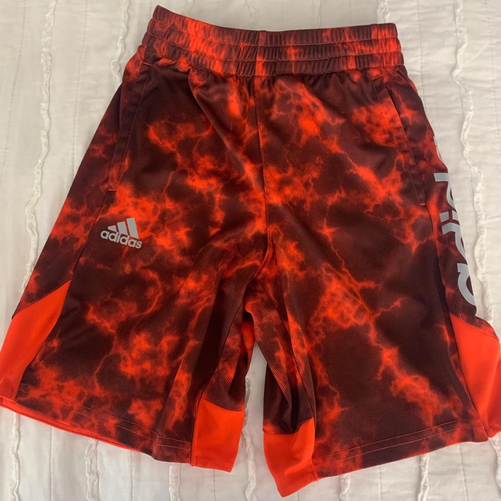 Adidas orange patterned athletic shorts